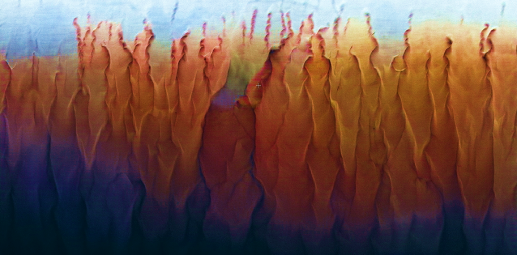 Orange flame like lines spreading onto a blue background.